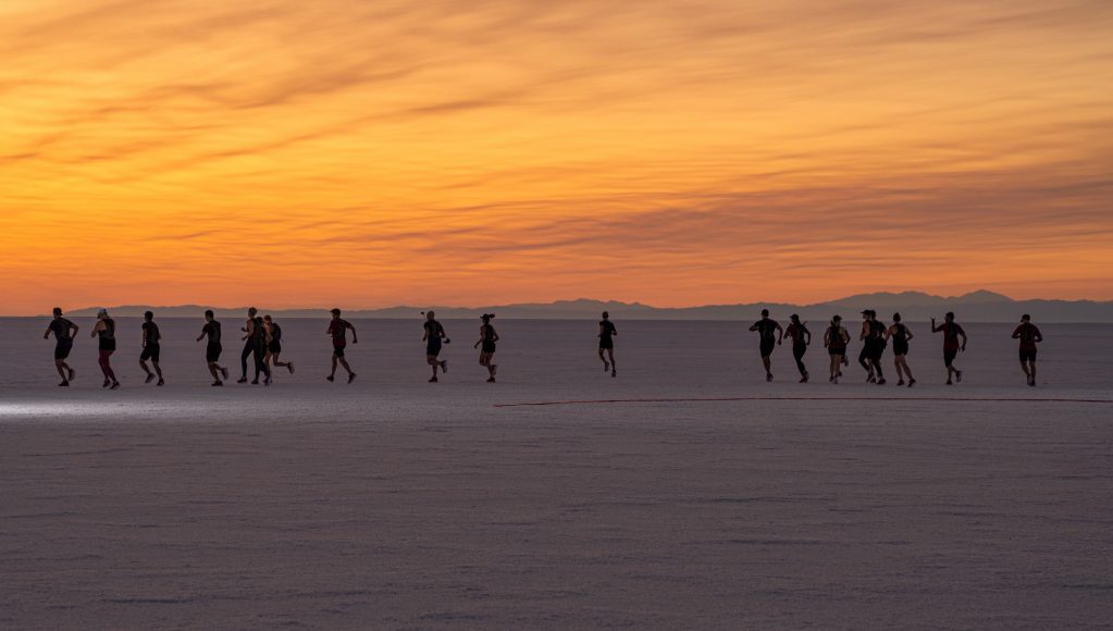 Runners start line sunrise