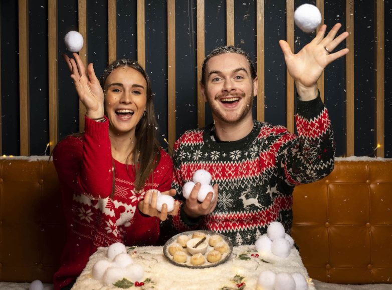 EDITORIAL USE ONLY
Customers interact with dough balls to mark the return of ‘snowball dough ball day’ which has been announced by PizzaExpress and will be on Thursday December 1, customers can enjoy the treat for £1 with all proceeds going to music therapy charity Nordoff Robbins. Issue date: Tuesday November 15, 2022. PA Photo. Photo credit should read John Nguyen/PA Wire