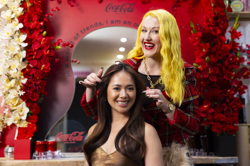 Sophia Hilton from Not Another Salon applies the finishing touches to a customer at the Flavour Parlour, a new salon celebrating the full range of Coca-Cola flavours, in London. Issue date: Monday June 3, 2024. PA Photo. Free hair transformations are available at the salon from June 6 – 8, allowing fans to get a full hair transformation based on their favourite flavour, including celeb-inspired Cherry Cola, Vanilla and Lemon. Photo credit: David Parry/PA Media Assignments