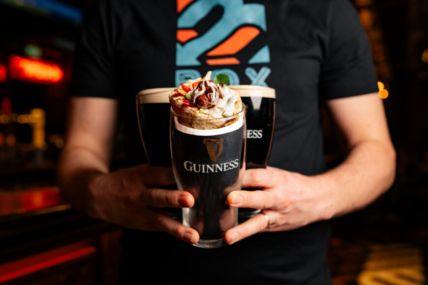 Holding Kebab and Guinness