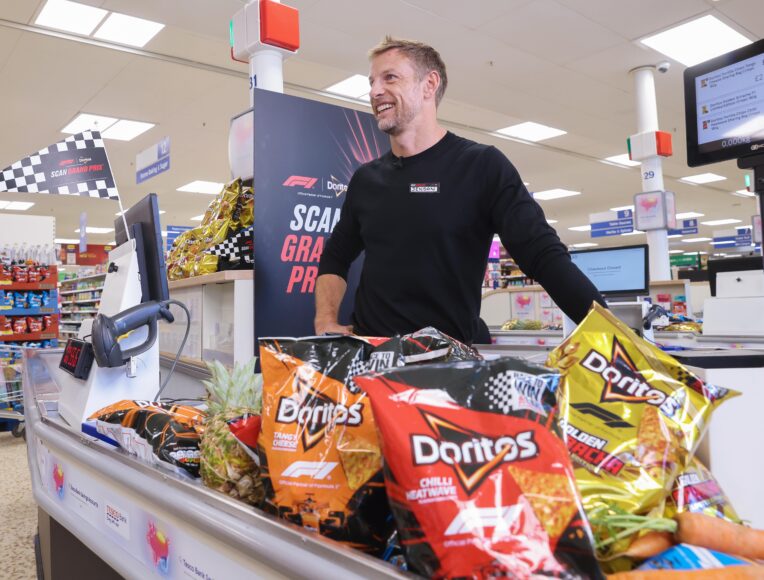 *** FREE FOR EDITORIAL USE ***
Formula 1 World Champion Jenson Button swapped the track for the till in a high-octane race against the clock in the Doritos Scan Grand Prix but was beaten by 29-year-old Rofiat Adeleke